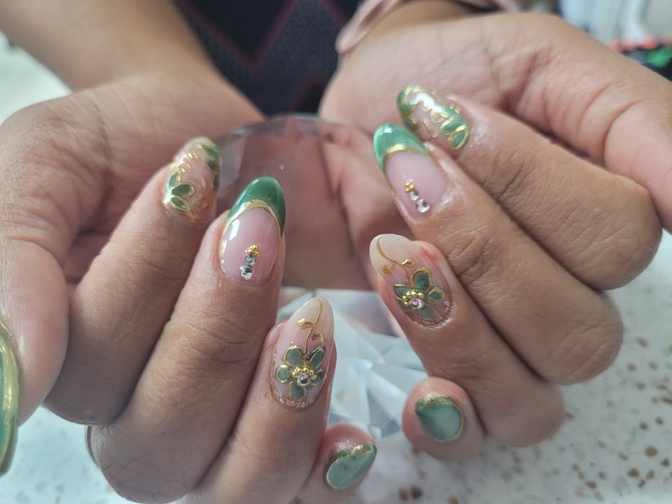 Colorful nail art on neatly shaped nails